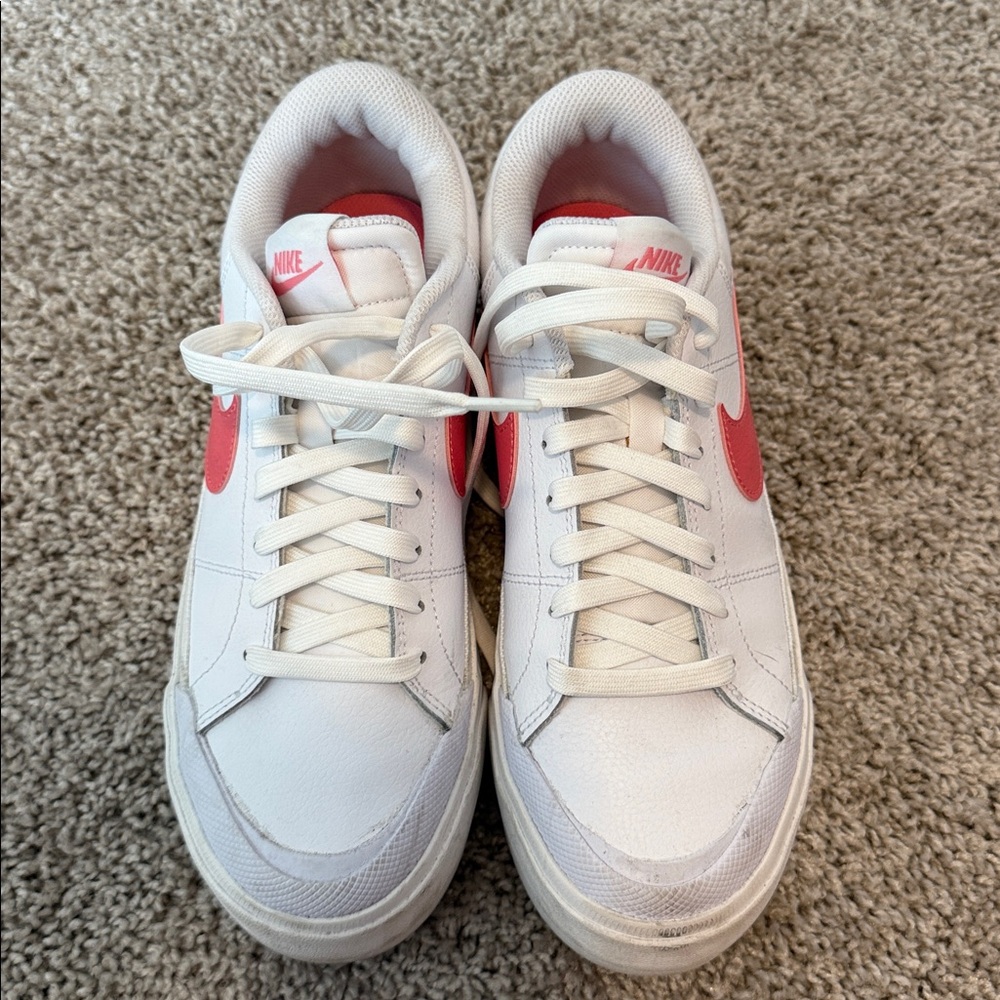 Nike White Sneakers with Pink Accents